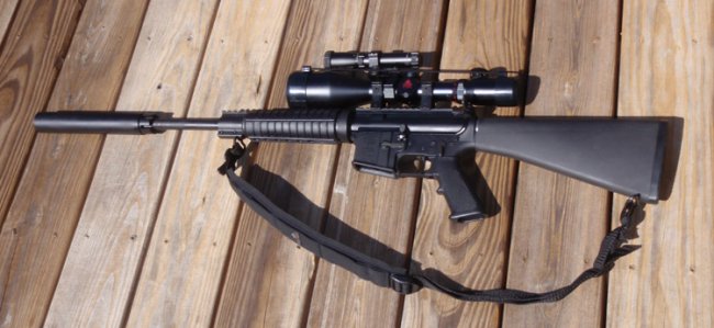 AR- 15 6.5 Grendel w suppressor, red dot & laser.jpg