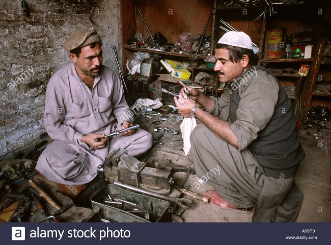 pakistan-nwfp-darra-adam-khel-men-making-rifle-bolts-A90R91.jpg
